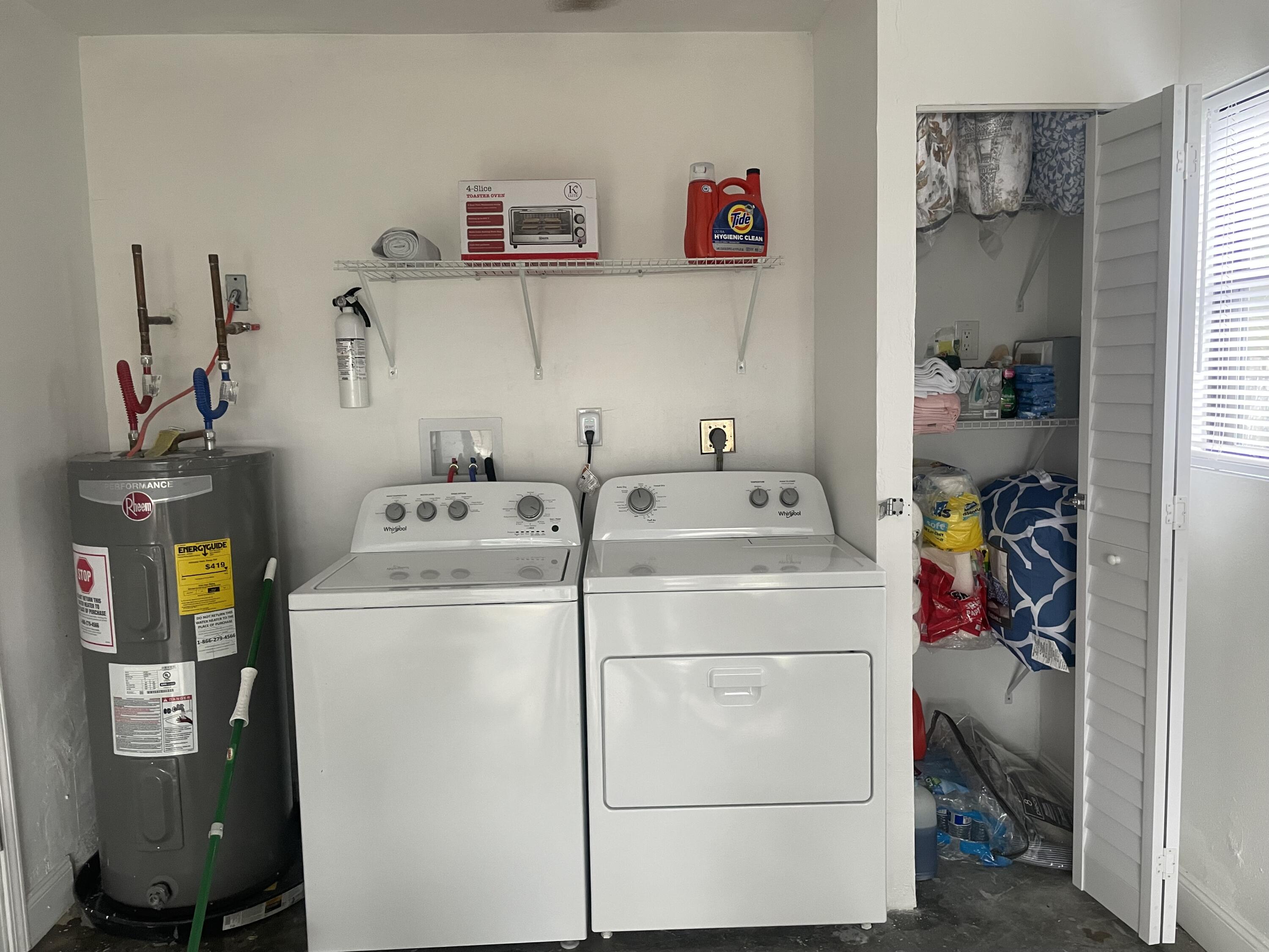 983 Emerald Road Southeast Palm Bay, FL 32909 - Photo 30 of 33 LAUNDRY IN GARAGE