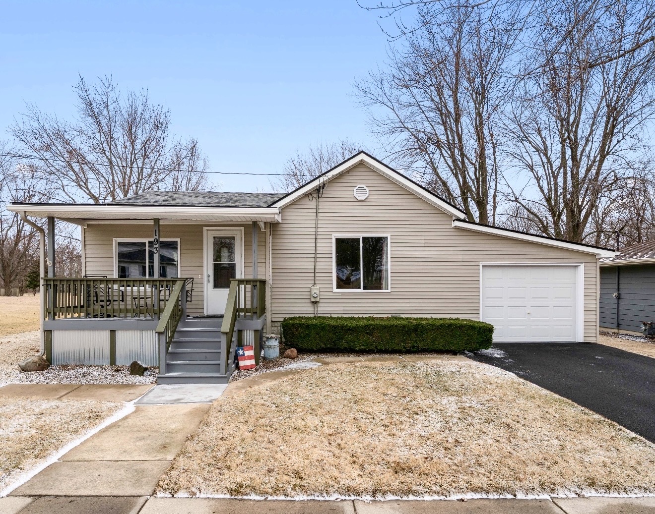 193 Chicago Road Paw Paw, IL 61353 - Photo 1 of 37 a front view of a house with garden