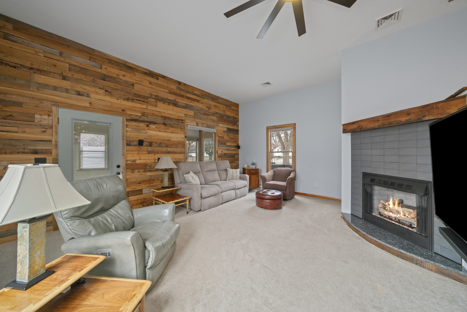 193 Chicago Road Paw Paw, IL 61353 - Photo 15 of 37 a living room with furniture and a fireplace