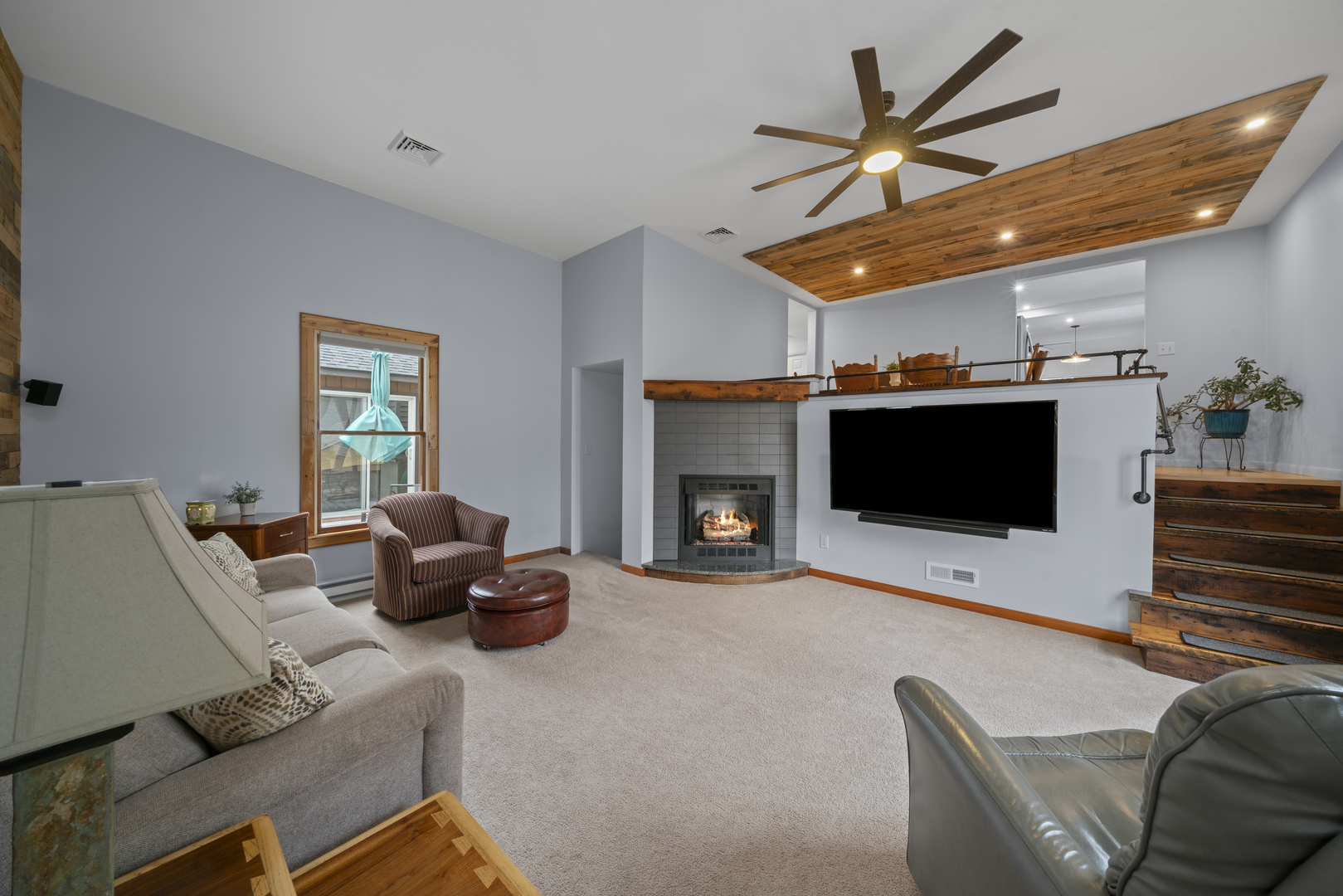193 Chicago Road Paw Paw, IL 61353 - Photo 16 of 37 a living room with furniture and a flat screen tv