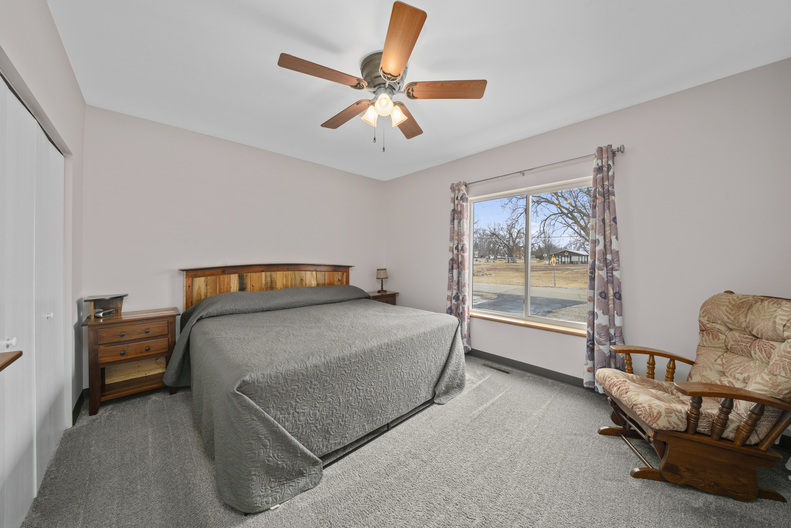 193 Chicago Road Paw Paw, IL 61353 - Photo 19 of 37 a bedroom with a bed and a window