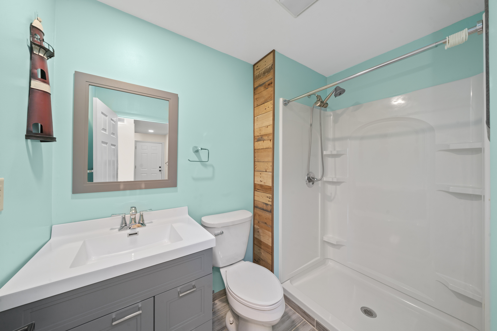 193 Chicago Road Paw Paw, IL 61353 - Photo 22 of 37 a bathroom with a sink a toilet and shower
