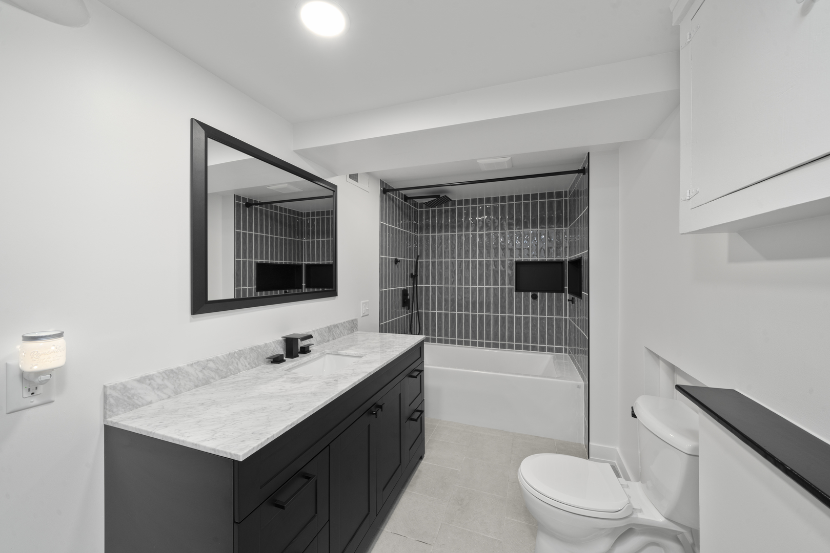 193 Chicago Road Paw Paw, IL 61353 - Photo 23 of 37 a bathroom with a sink vanity granite toilet tub and shower