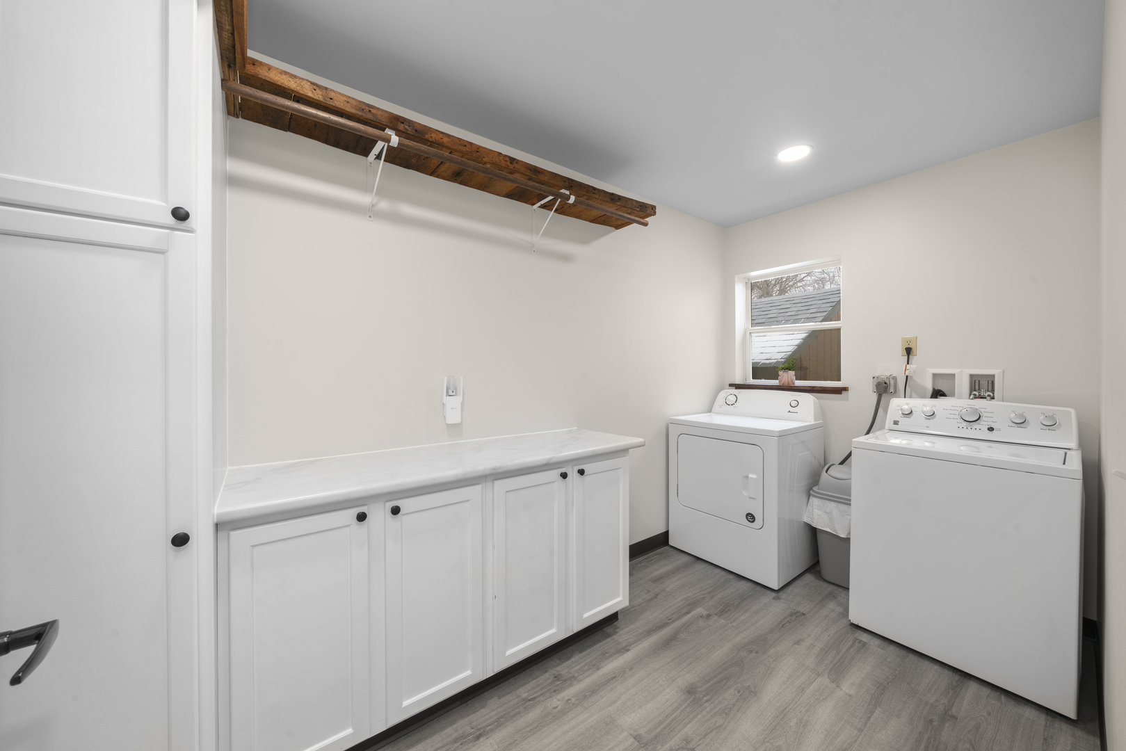 193 Chicago Road Paw Paw, IL 61353 - Photo 25 of 37 a utility room with cabinets washer and dryer