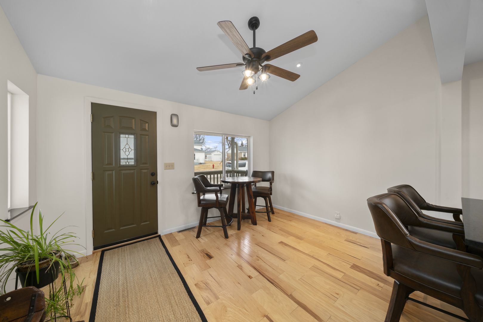 193 Chicago Road Paw Paw, IL 61353 - Photo 4 of 37 a view of a workspace with furniture and wooden floor