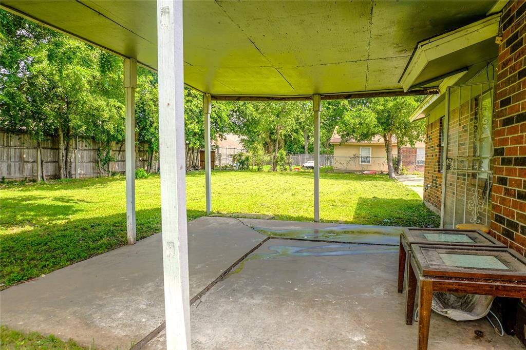 300 Coury Road Everman, TX 76140 - Photo 19 of 29 a view of a back yard
