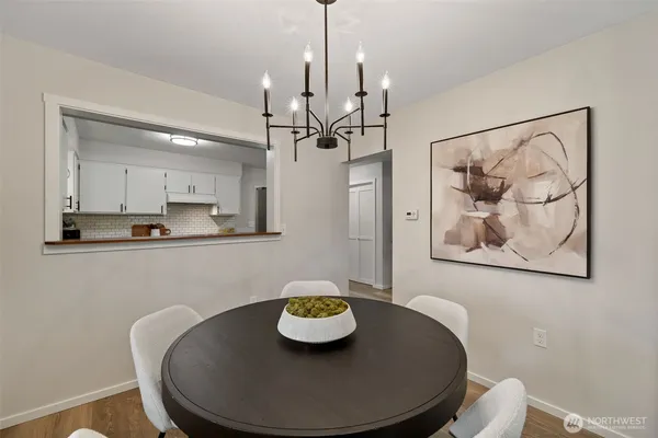 a view of a dining room with furniture