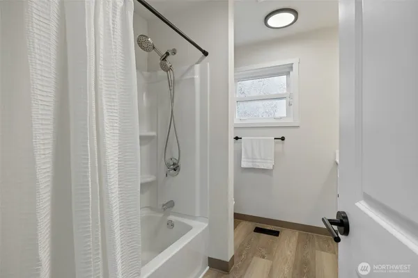 a bathroom with a bathtub