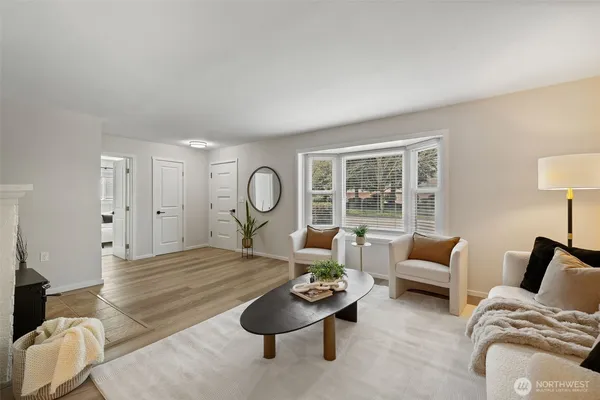 a bed room with furniture and a window
