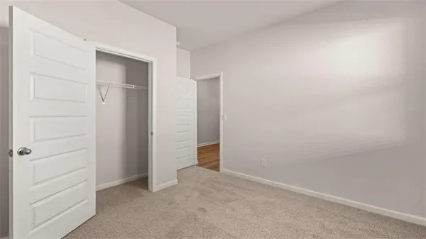 an empty room with closet