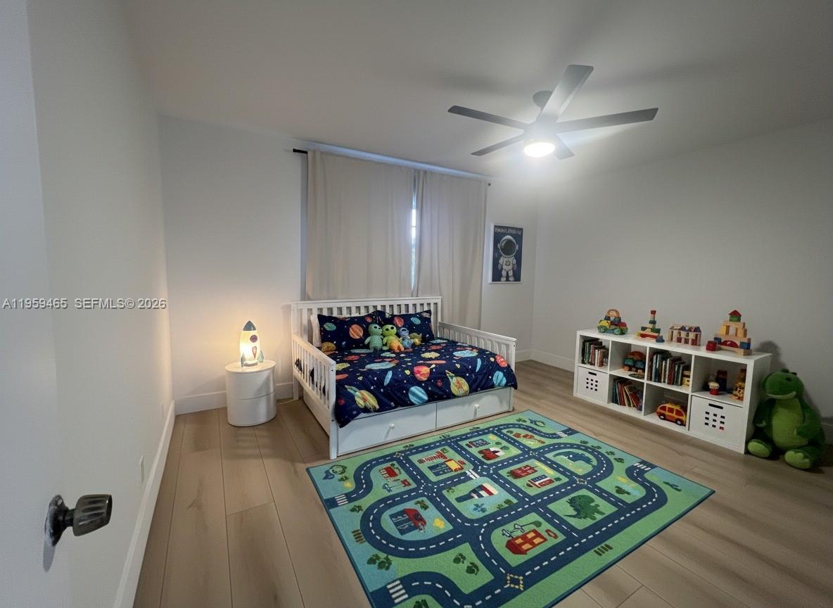 5100 Southwest 90th Avenue, Unit 302 Cooper City, FL 33328 - Photo 10 of 11 a living room with furniture and a rug