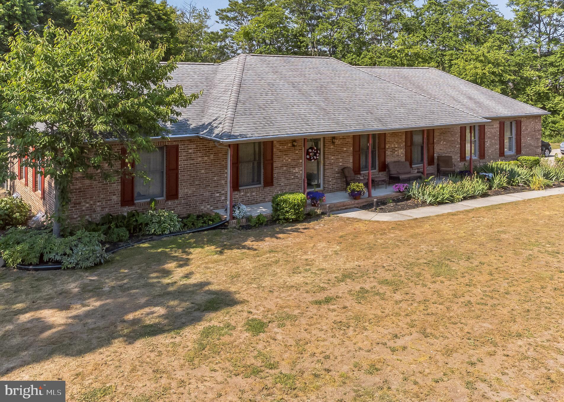 1776 Church Road Southampton, NJ 08088 - Photo 1 of 32 a front view of a house with garden