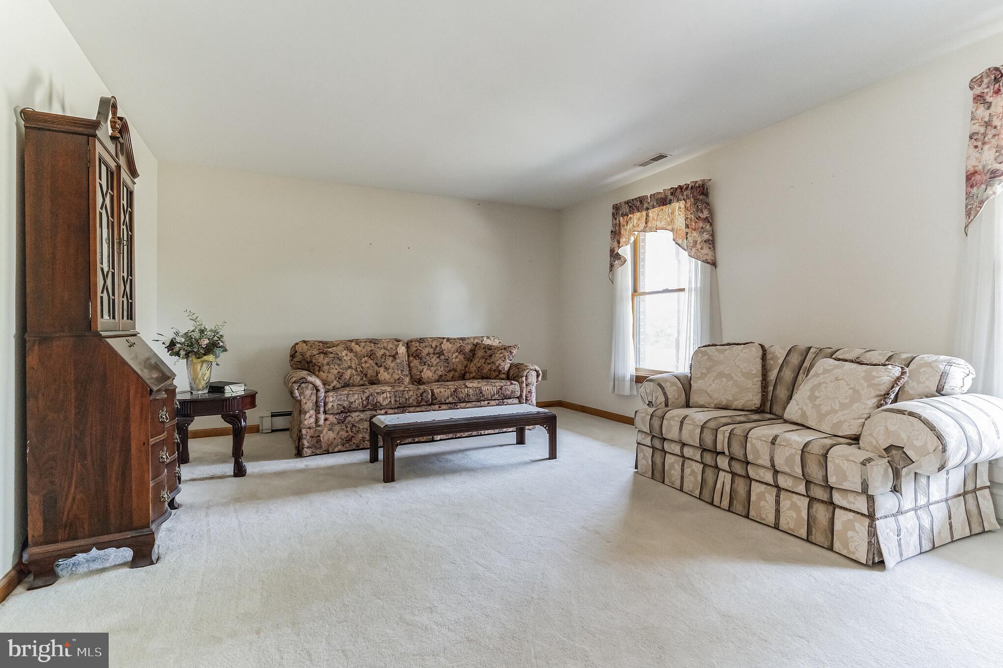 1776 Church Road Southampton, NJ 08088 - Photo 16 of 32 a living room with furniture and a window