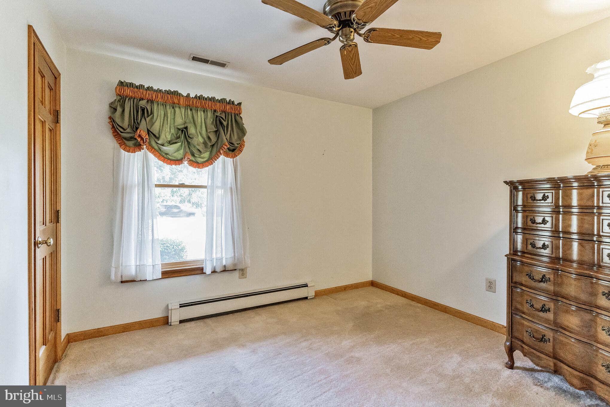 1776 Church Road Southampton, NJ 08088 - Photo 23 of 32 an empty room with windows and fan