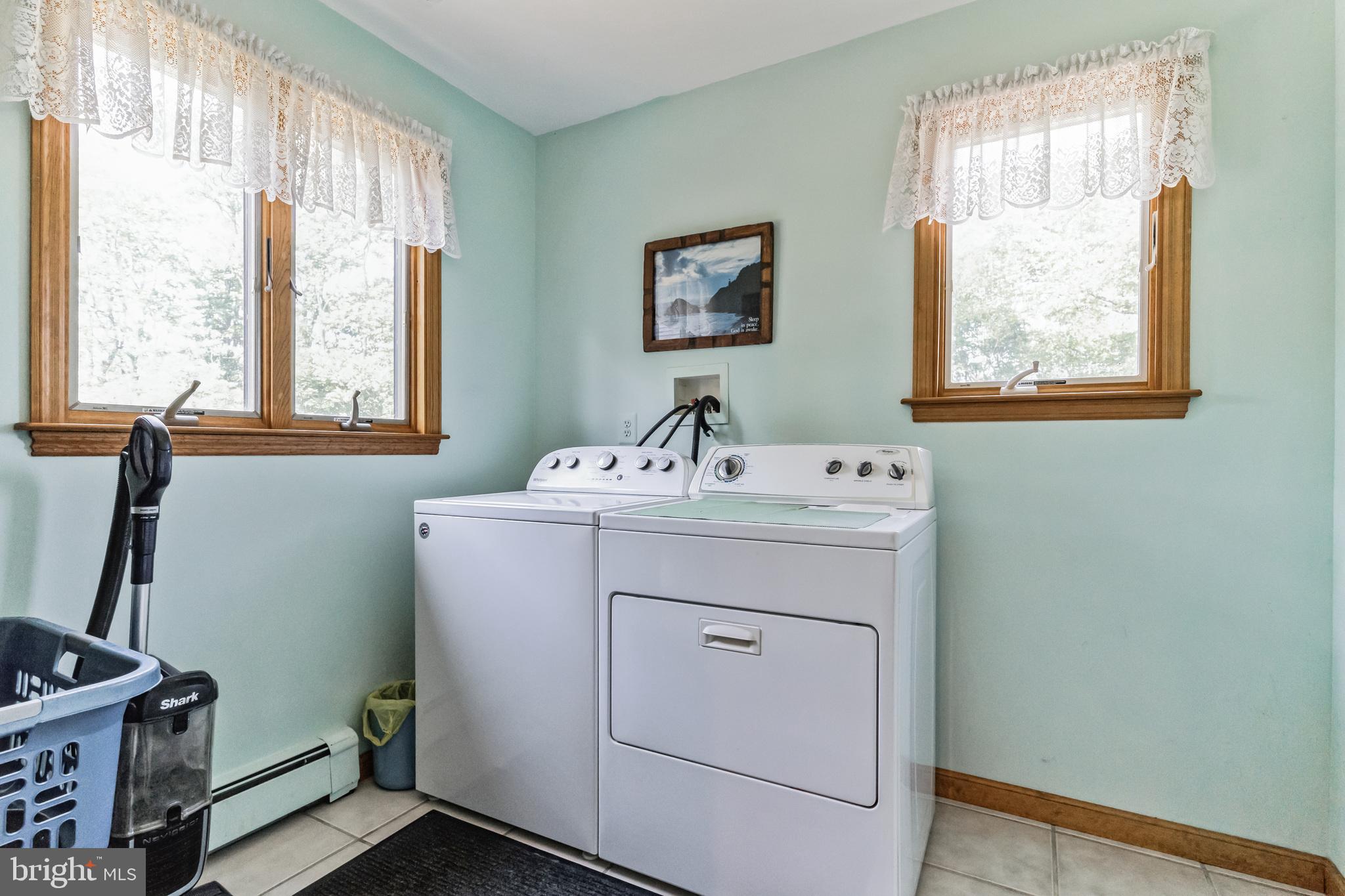 1776 Church Road Southampton, NJ 08088 - Photo 25 of 32 a utility room with a window dryer and washer