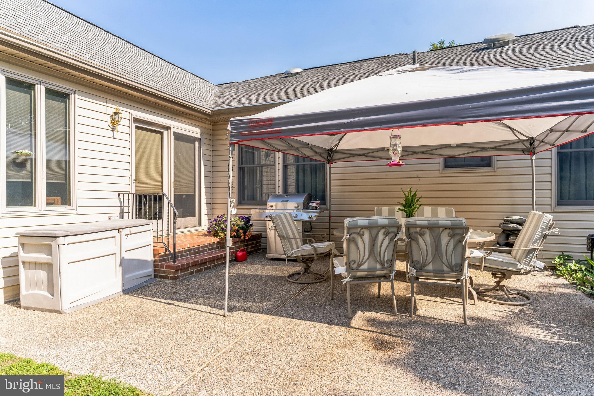 1776 Church Road Southampton, NJ 08088 - Photo 30 of 32 a patio with table and chairs