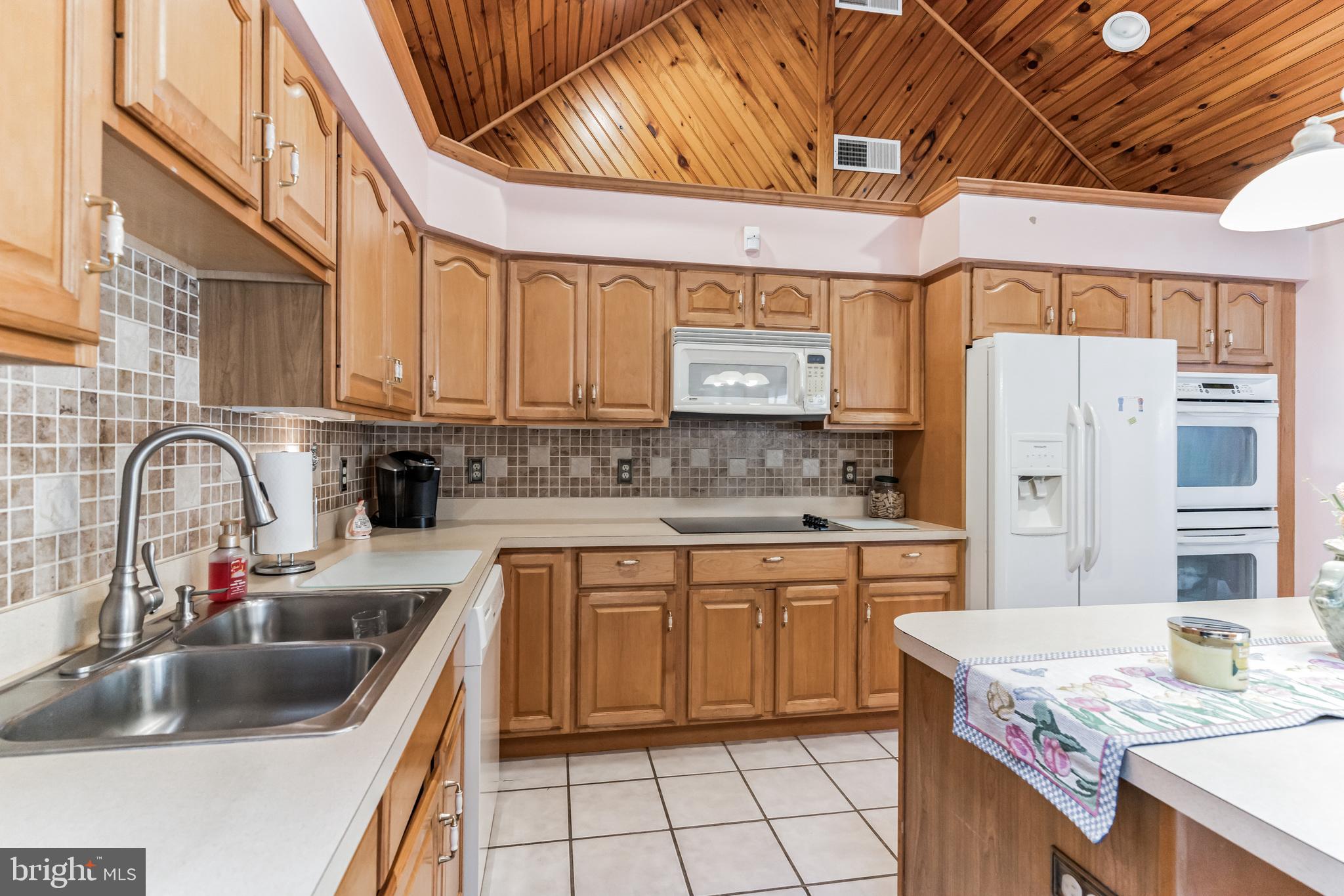 1776 Church Road Southampton, NJ 08088 - Photo 9 of 32 a kitchen with a sink cabinets and stainless steel appliances