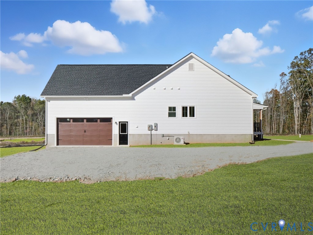 3706 Broad St Road Gum Spring, VA 23065 - Photo 34 of 34 a view of a house with a yard and garage