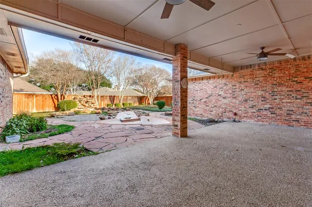 a view of a room with a flat screen tv