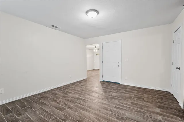 a kitchen with stainless steel appliances granite countertop wooden cabinets stove top oven and sink