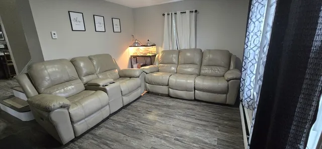 a living room with furniture and a couch