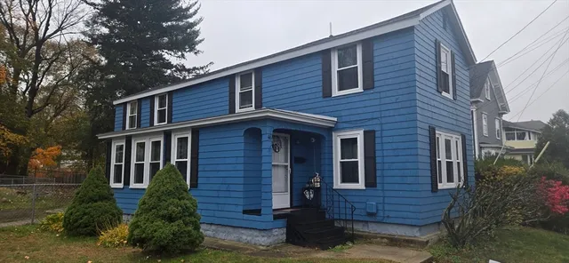 a brick building that has lots of windows in it
