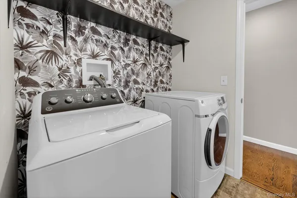 a utility room with dryer and washer
