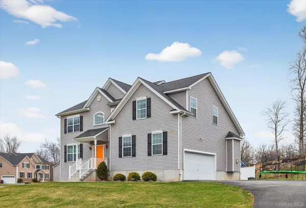 a view of a house with a swimming pool