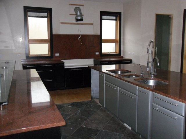 132 Old Dundee Road Barrington, IL 60010 - Photo 6 of 22 a kitchen with a sink and a stove