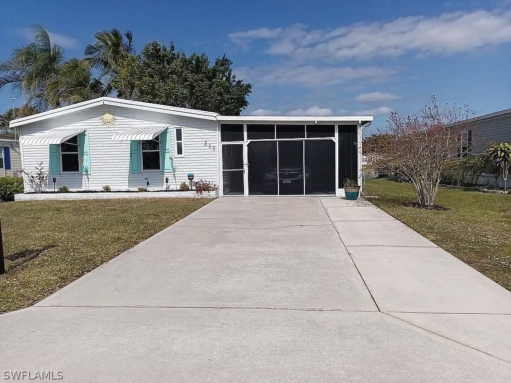 311 Riverwood Road Naples, FL 34114 - Photo 1 of 18 Gallery Image 1