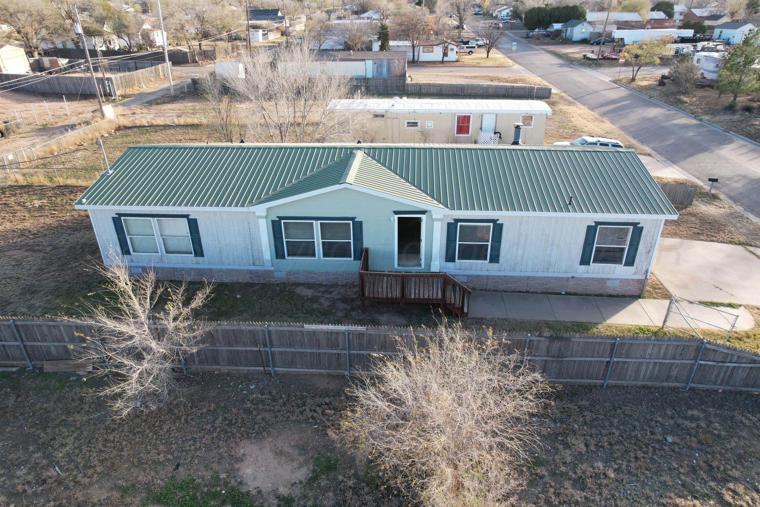 406 North Independence Street Amarillo, TX 79106 - Photo 5 of 19 a aerial view of a house with a yard