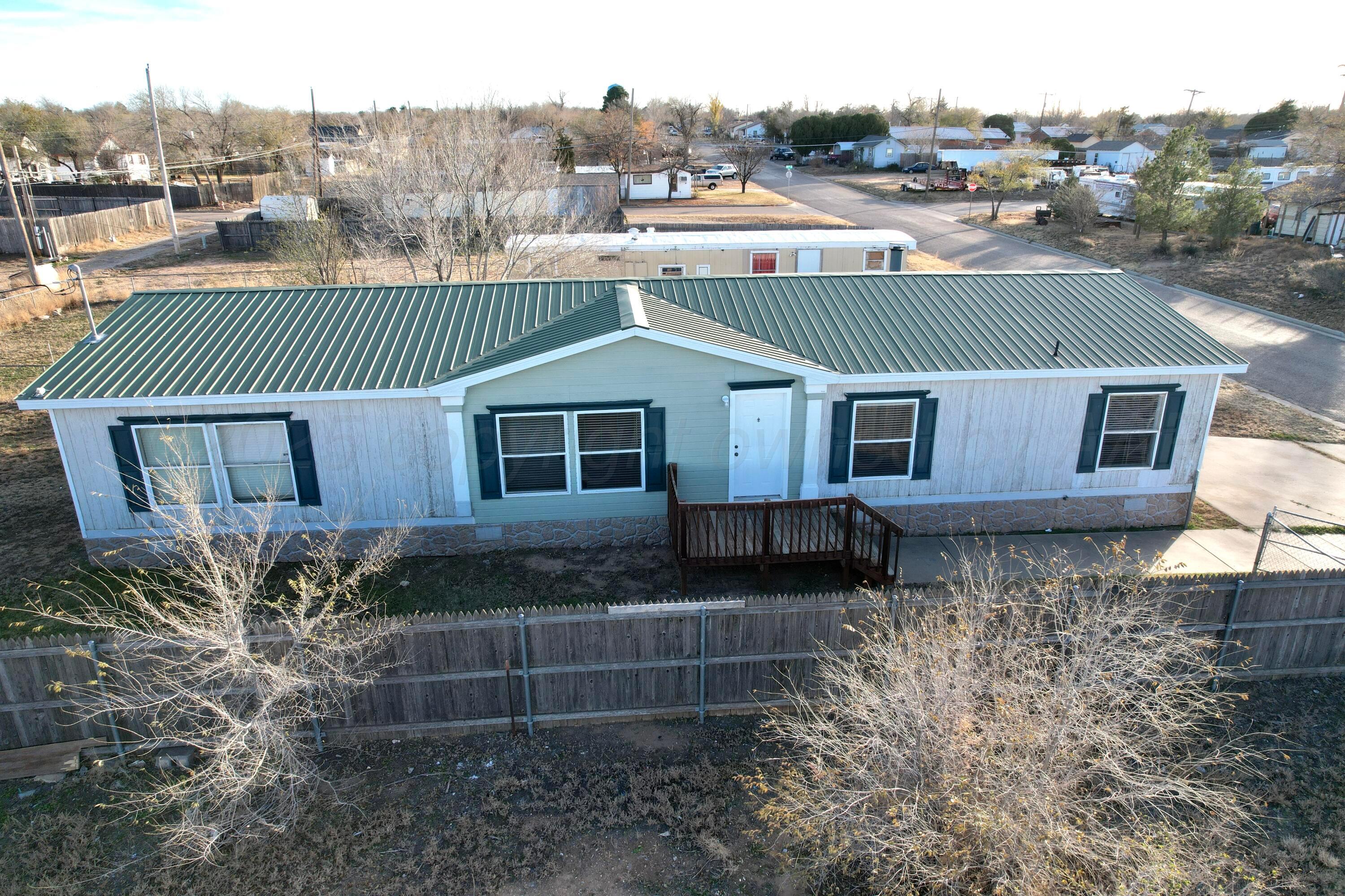 406 North Independence Street Amarillo, TX 79106 - Photo 6 of 19 a view of a house with a yard