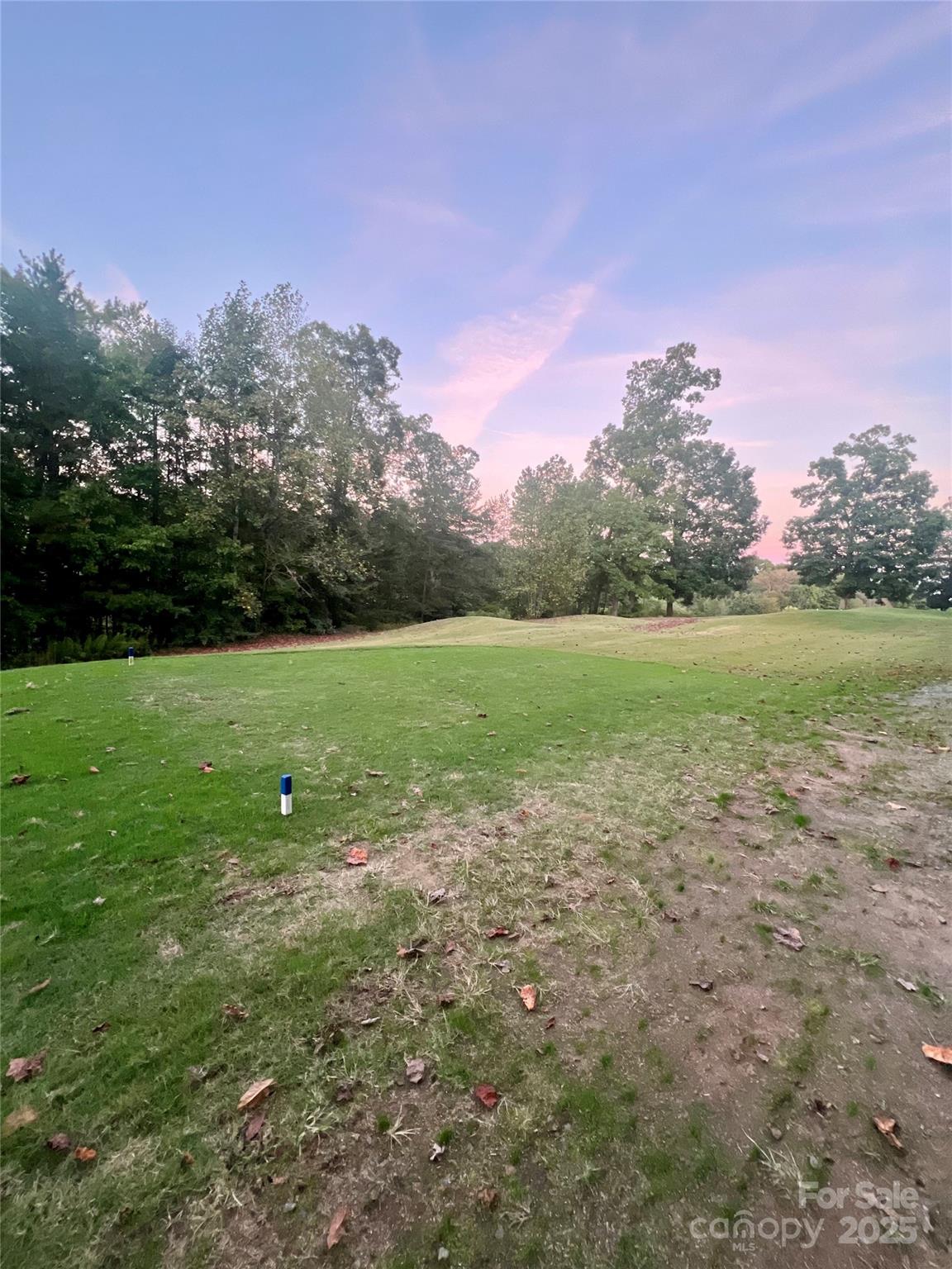 Lot 6 Scenic Ridge Drive Hickory, NC 28601 - Photo 5 of 5 a view of a field with an trees in the background