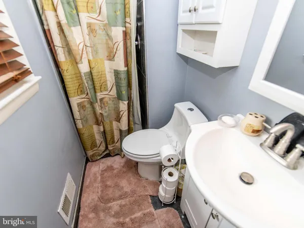 a bathroom with a sink and a toilet