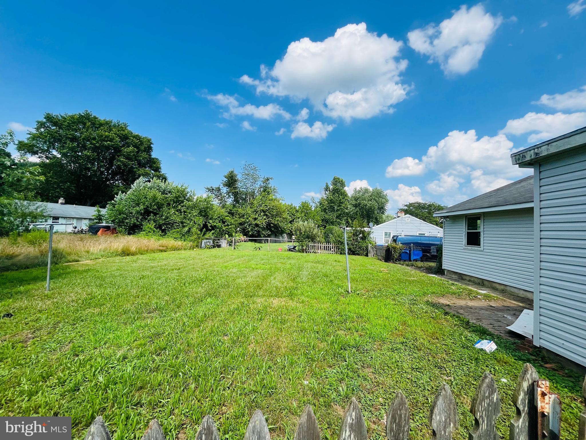 112 Kinsley Road Pemberton, NJ 08068 - Photo 12 of 13 a view of a house with a backyard