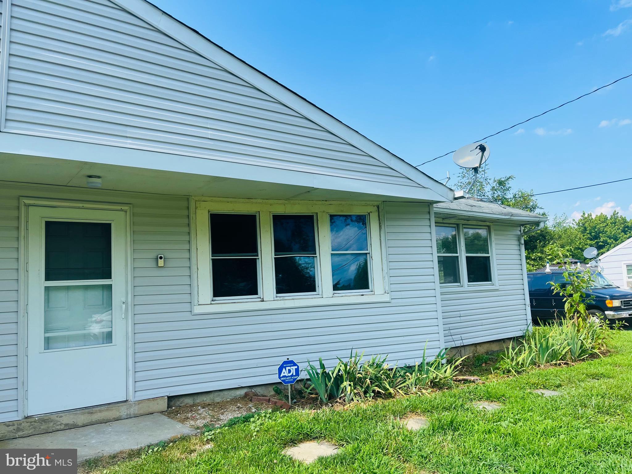 112 Kinsley Road Pemberton, NJ 08068 - Photo 2 of 13 a front view of a house with a yard
