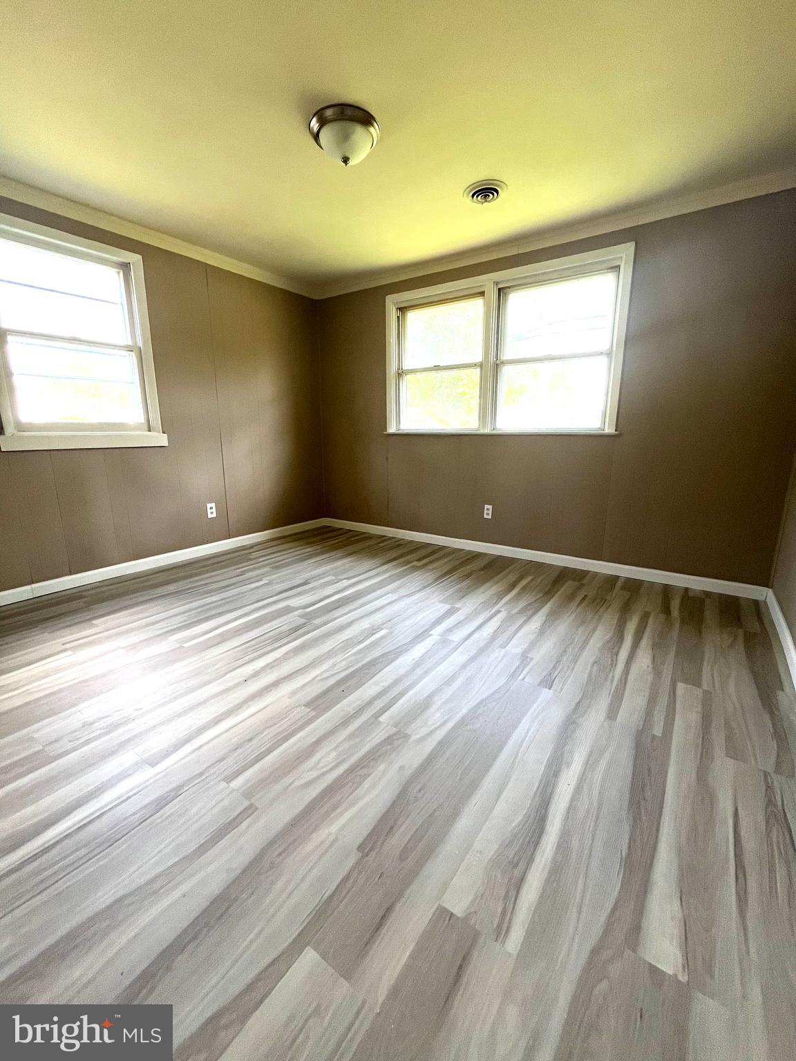 112 Kinsley Road Pemberton, NJ 08068 - Photo 7 of 13 a view of an empty room and window