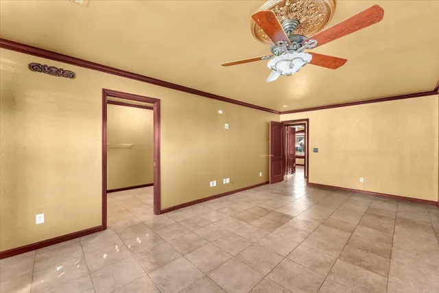 an aerial view of a house with a lake view