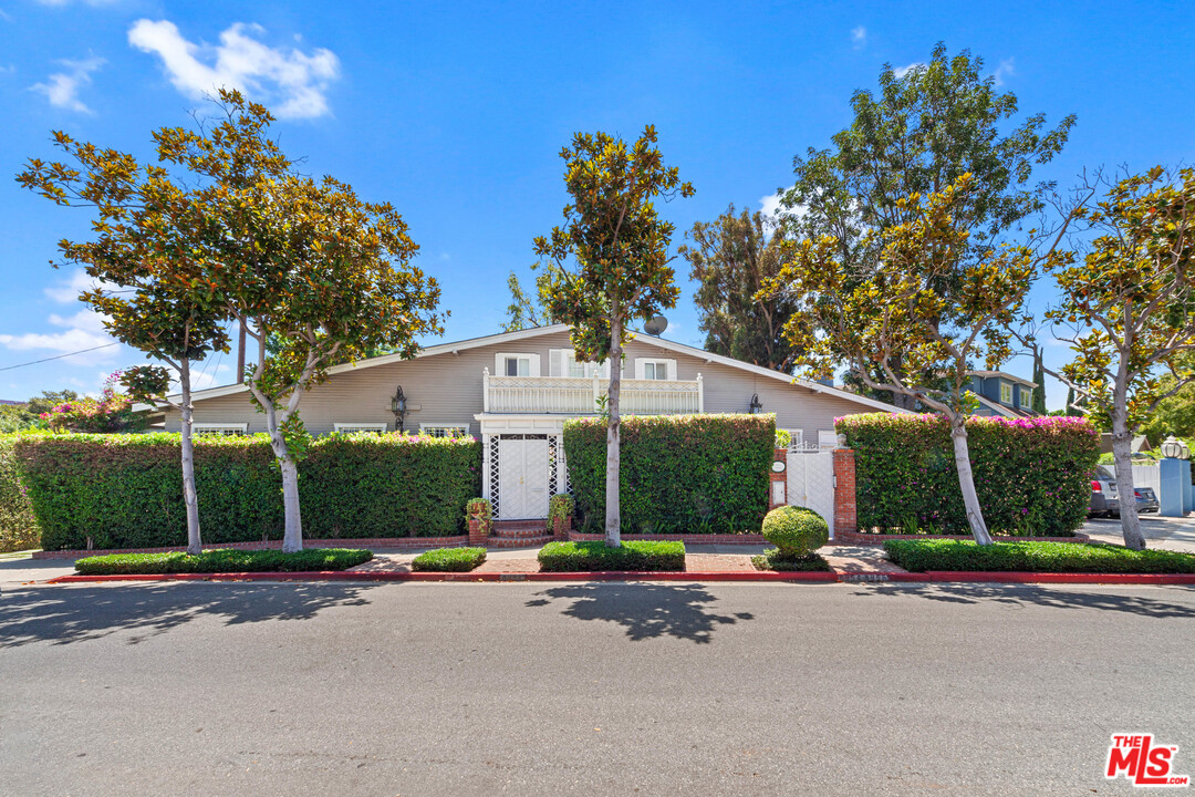 a view of a parked cars in front of house