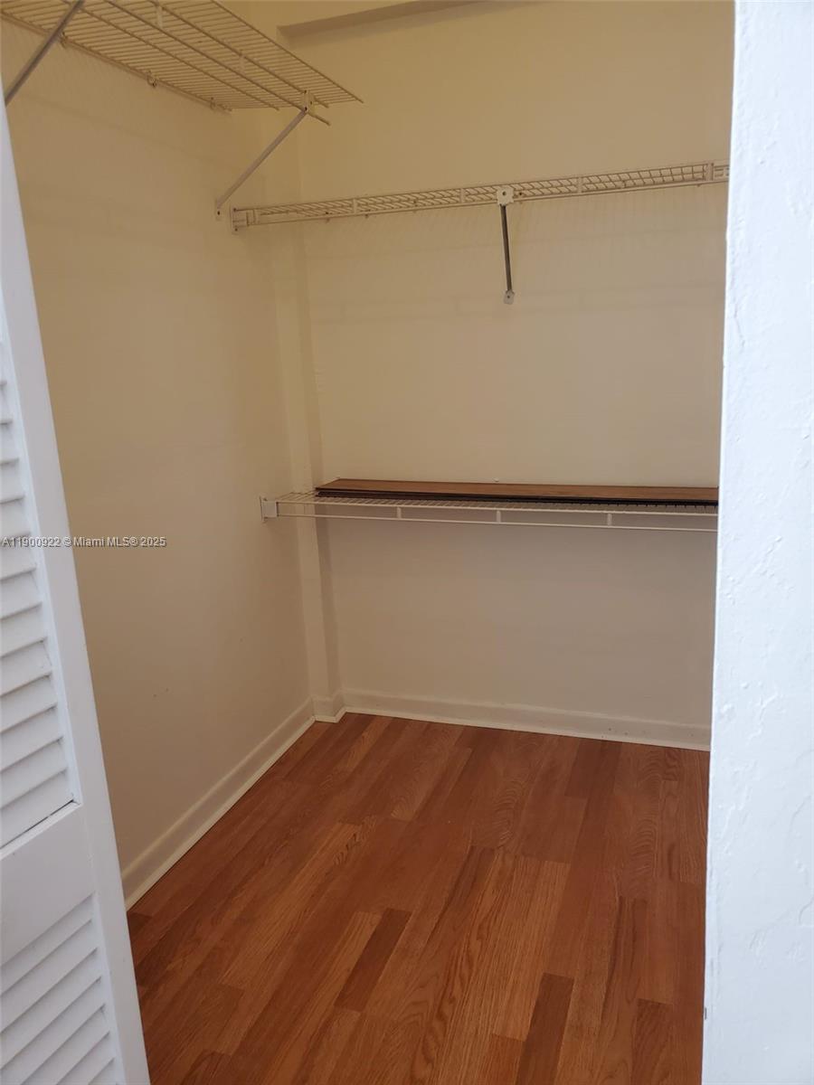 4206 Southwest 87th Terrace, Unit 4206 Davie, FL 33328 - Photo 19 of 37 a view of a room with wooden floor