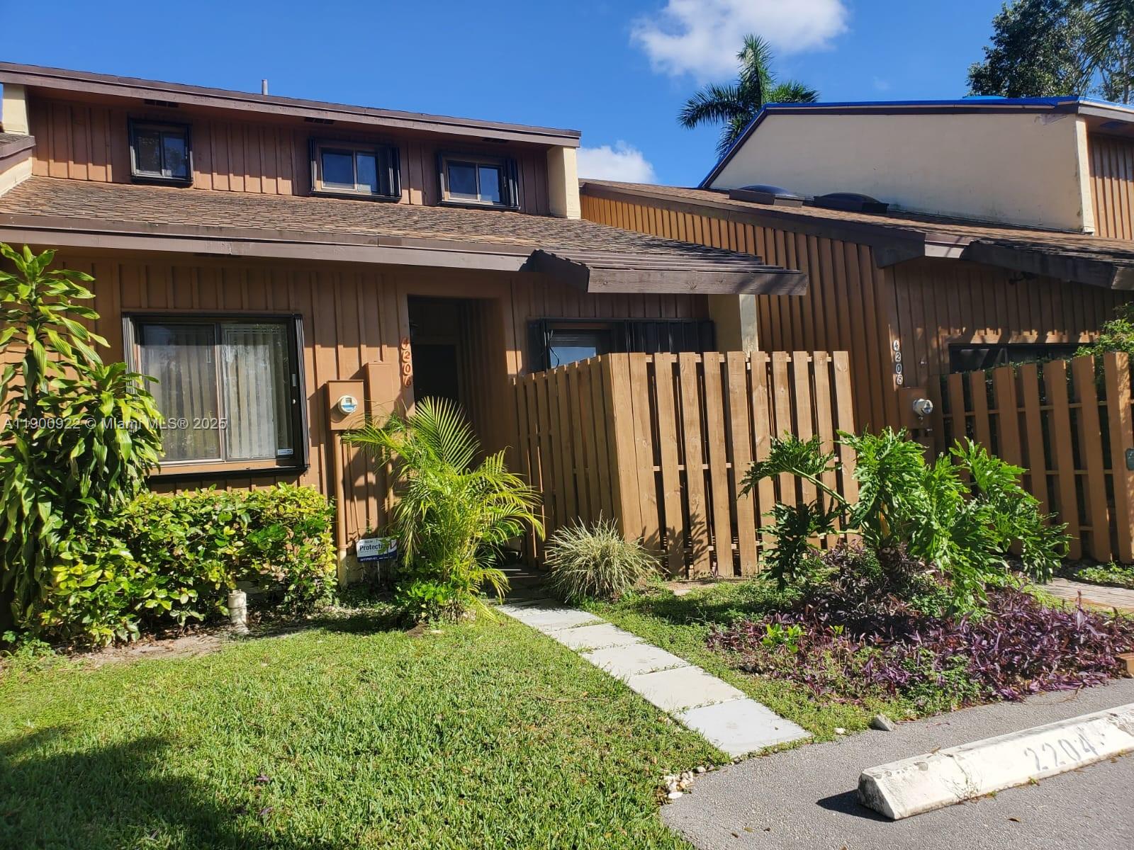 4206 Southwest 87th Terrace, Unit 4206 Davie, FL 33328 - Photo 27 of 37 front view of a house