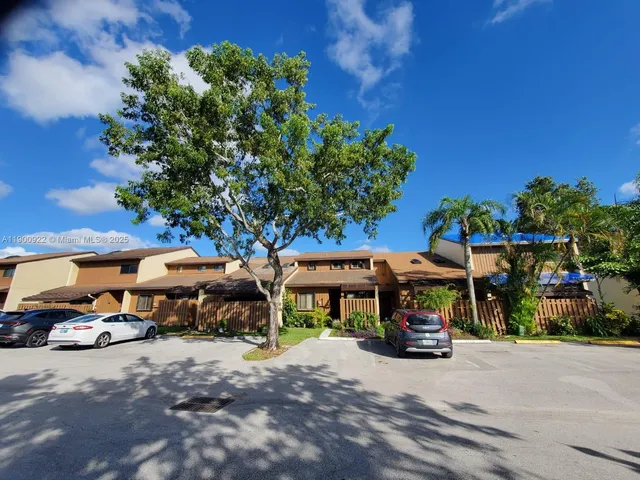 a view of a street with cars