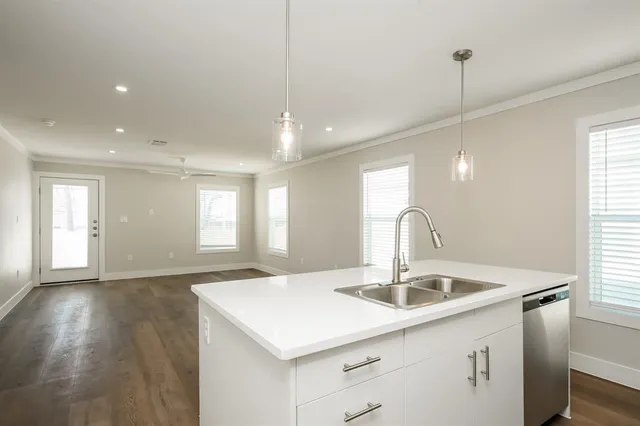 a kitchen with a stove and a microwave