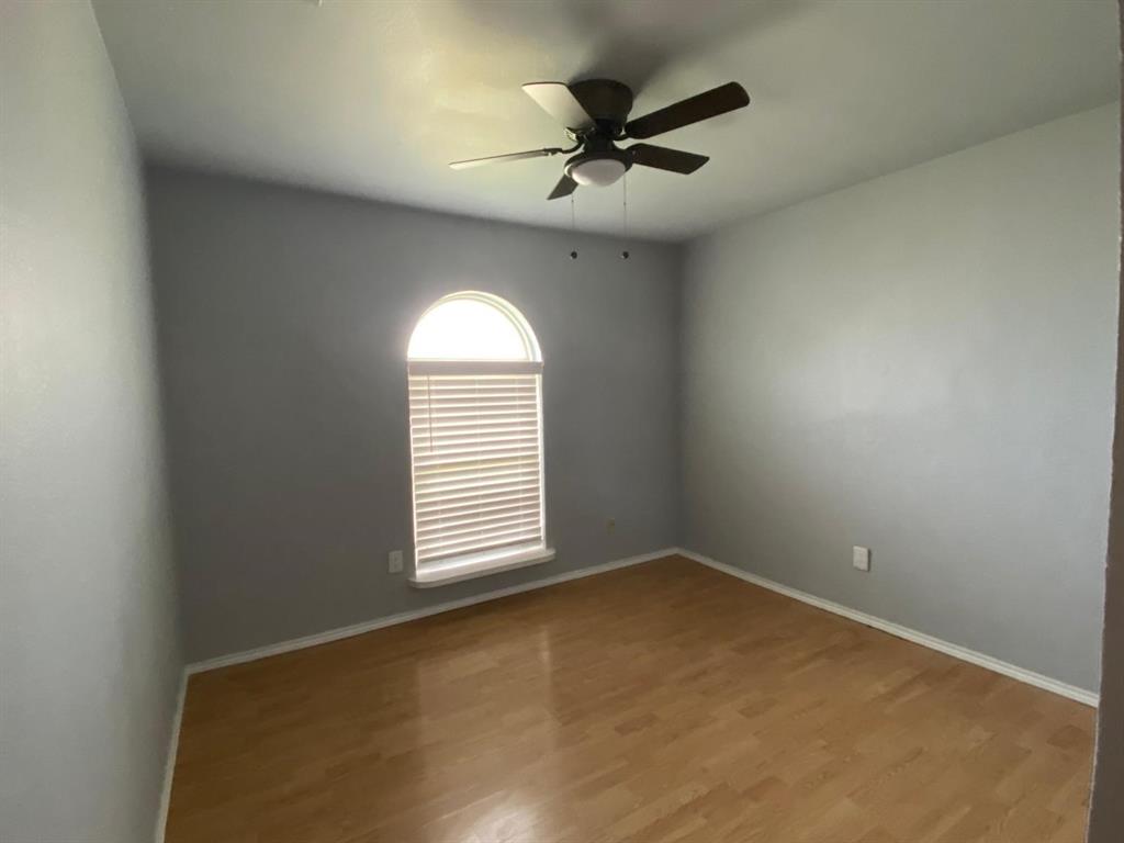 5217 Kisor Drive The Colony, TX 75056 - Photo 6 of 15 an empty room with a window