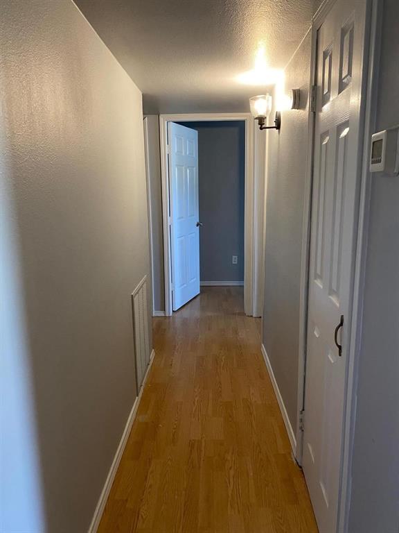 5217 Kisor Drive The Colony, TX 75056 - Photo 10 of 15 a view of hallway with shower