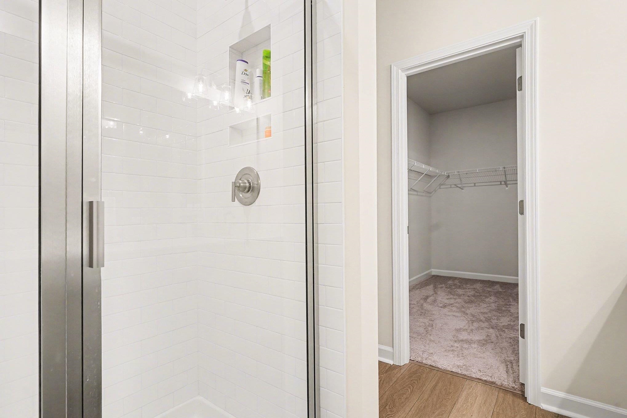 3005 Palma Way Myrtle Beach, SC 29579 - Photo 15 of 30 Full bath with a spacious closet, light wood finished floors, and a shower stall