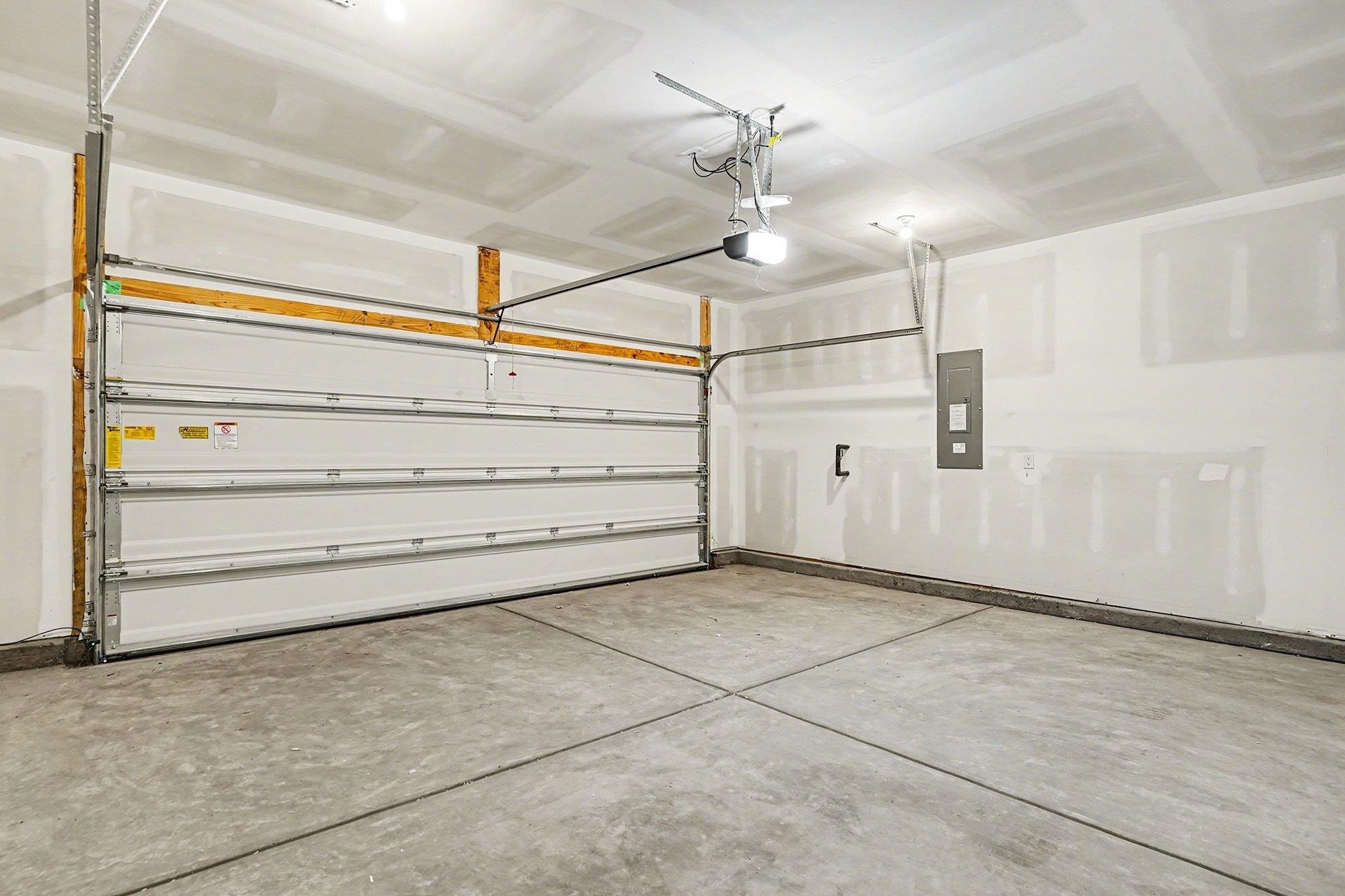 3005 Palma Way Myrtle Beach, SC 29579 - Photo 24 of 30 Garage with electric panel and a garage door opener
