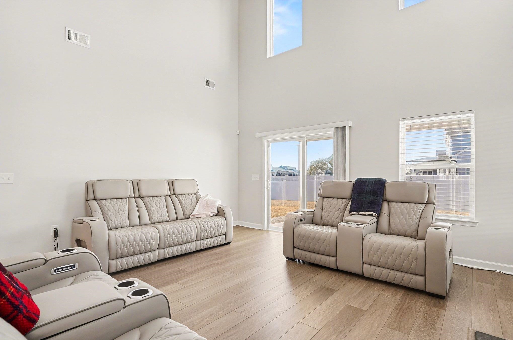 3005 Palma Way Myrtle Beach, SC 29579 - Photo 4 of 30 Living area featuring light wood finished floors and a high ceiling
