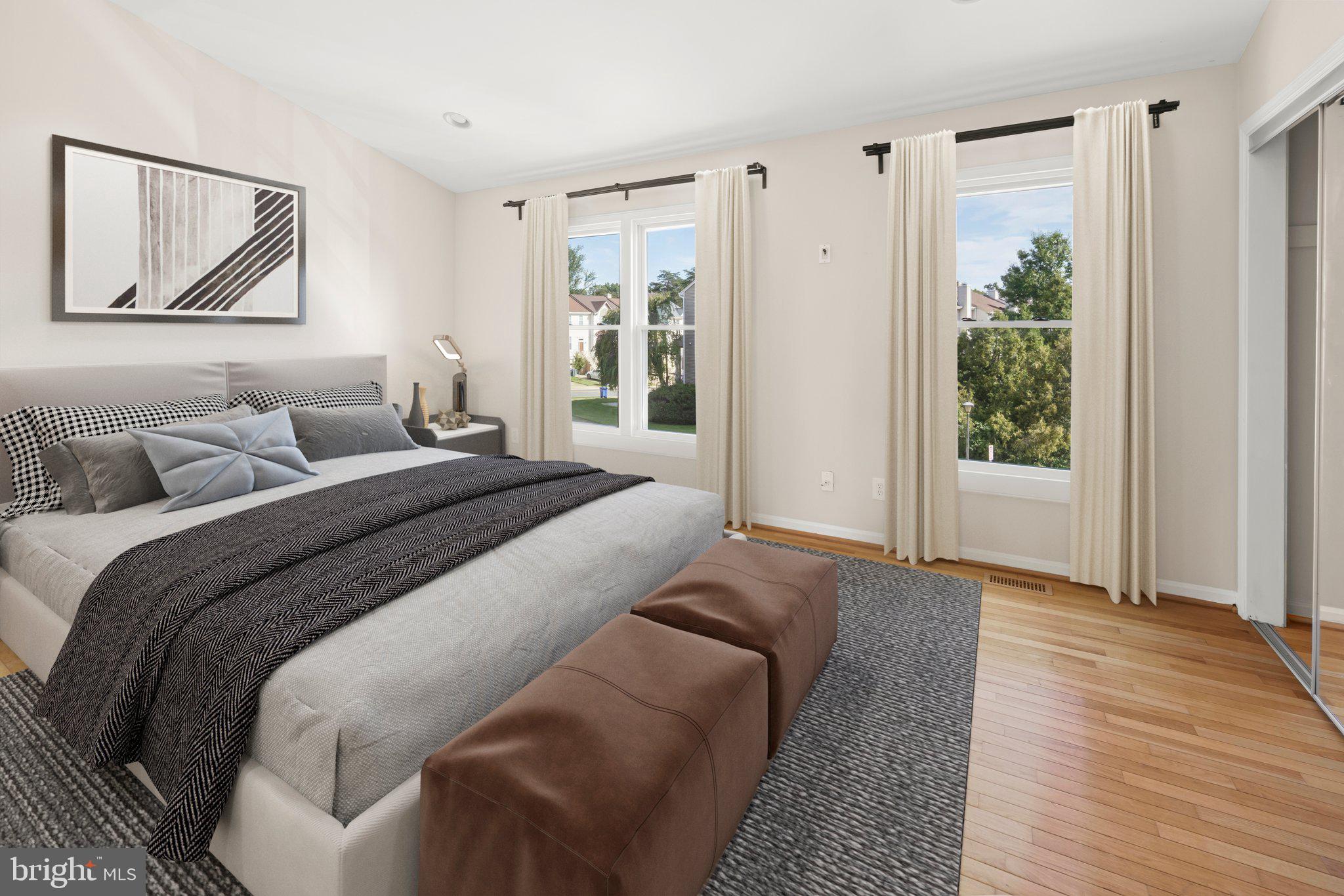 1451 Bluemont Court Herndon, VA 20170 - Photo 16 of 33 a bedroom with a bed and a window