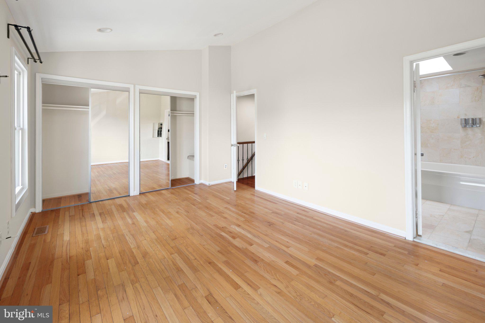 1451 Bluemont Court Herndon, VA 20170 - Photo 18 of 33 a view of empty room with wooden floor